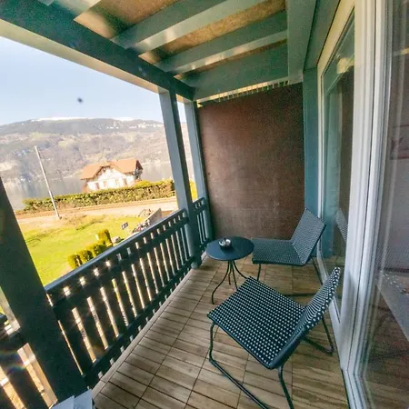 Surfers Near Interlaken, At With Pool