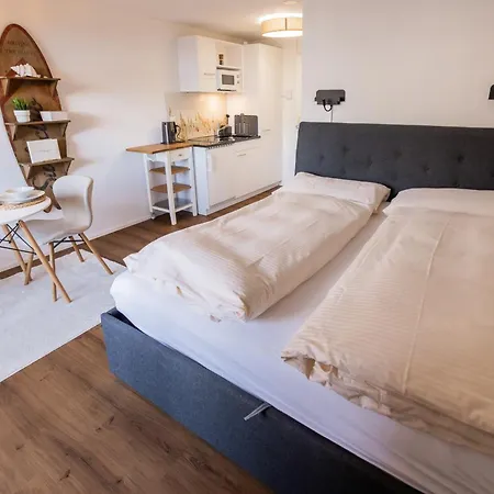 Surfers Near Interlaken, At With Pool