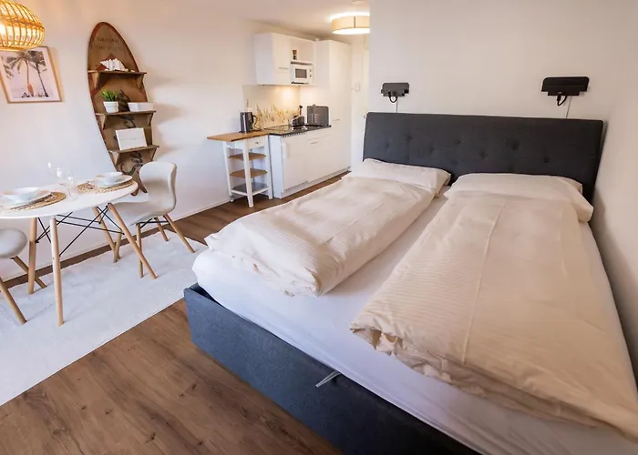 Surfers Near Interlaken, At With Pool